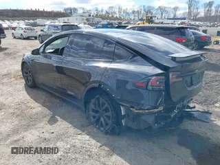 2023 Tesla Model X with VIN 7SAXCDE52PF425834, listed as a IAAI auction lot 41996298 with Not Provided miles and . Bid and sale history available at DreamBid. Image 3.