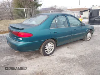 1998 Ford Escort SE with VIN 1FAFP13P0WW255845, listed as a IAAI auction lot 41610842 with 144,582 mi miles. Bid and sale history available at carsss.com. Image 4.