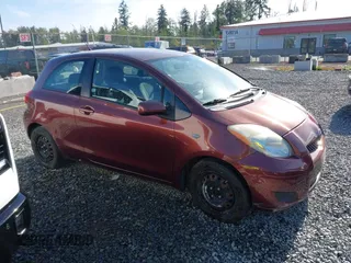 2009 Toyota Yaris with VIN JTDJT903295239611, listed as a IAAI auction lot 42216768 with 122,512 mi miles and . Bid and sale history available at DreamBid. Image 13.