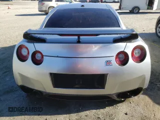 2009 Nissan GT-R Premium z VIN JN1AR54F49M252803, wystawiony jako Copart lot #83905134 z przebiegiem Nie podano mil oraz Nie do naprawy • Non repairable. Historia ofert i sprzedaży dostępna na DreamBid. Obrazek 6.