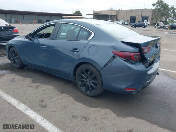 2023 Mazda Mazda3 Sedan 2.5 S Carbon Edition with VIN 3MZBPBCM4PM358964, listed as a IAAI auction lot 41718813 with 34,215 mi miles. Bid and sale history available at carsss.com. Image 3.