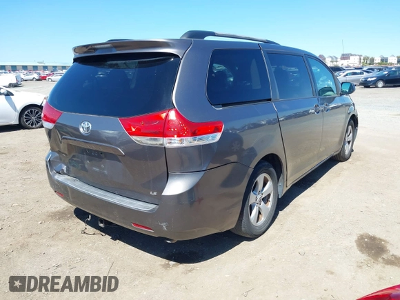 2011 Toyota Sienna LE AAS with VIN 5TDKK3DC0BS055346, listed as a IAAI auction lot 41834715 with 124,847 mi miles. Bid and sale history available at carsss.com. Image 4.