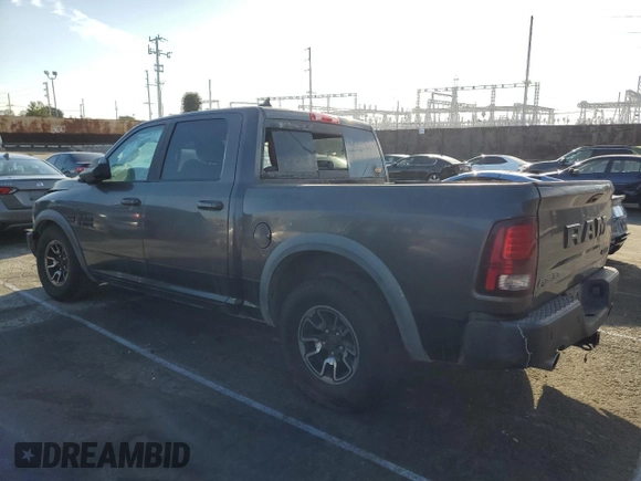 2016 Ram 1500 Rebel z VIN 1C6RR7YT6GS211830, wystawiony jako Copart lot #54072485 z przebiegiem 56 512 mil mil oraz Szkody całkowita. Historia ofert i sprzedaży dostępna na DreamBid. Obrazek 2.