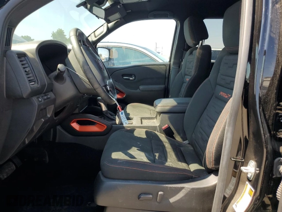 2024 Nissan Frontier SV with VIN 1N6ED1EJ4RN650125, listed as a Copart auction lot 65369825 with 14,282 mi miles and Salvage title. Bid and sale history available at DreamBid. Image 7.