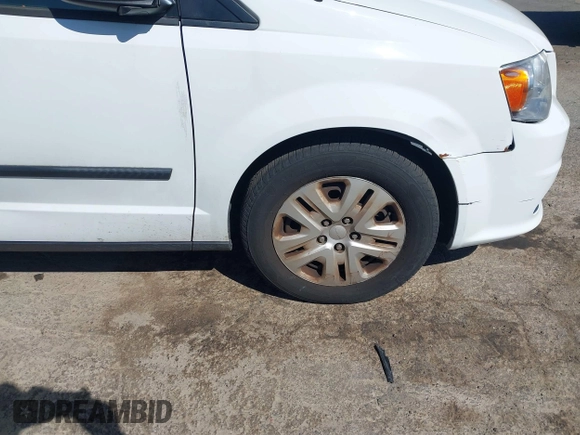2016 Dodge Grand Caravan SE with VIN 2C4RDGBG9GR401187, listed as a IAAI auction lot 42133432 with 107,742 mi miles and . Bid and sale history available at DreamBid. Image 12.