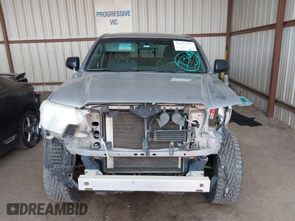 2014 Toyota Tacoma with VIN 3TMLU4EN3EM162738, listed as a IAAI auction lot 41871226 with 135,318 mi miles and . Bid and sale history available at DreamBid. Image 13.