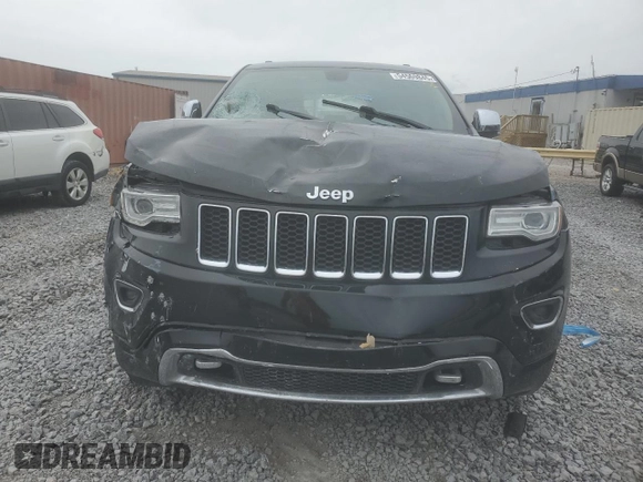 2015 Jeep Grand Cherokee Overland с VIN 1C4RJECG9FC620315, выставлен на аукционе Copart как лот 54569845 с пробегом 219 905 миль миль и Списание • Salvage title. История ставок и продаж доступна на DreamBid. Изображение 5.
