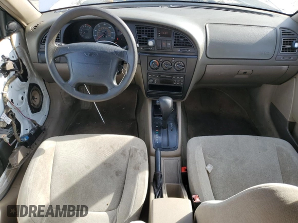 2001 Daewoo Nubira z VIN KLAJC52Z01K711120, wystawiony jako Copart lot #48926575 z przebiegiem 103 375 mil mil oraz Tytuł czysty. Historia ofert i sprzedaży dostępna na DreamBid. Obrazek 8.