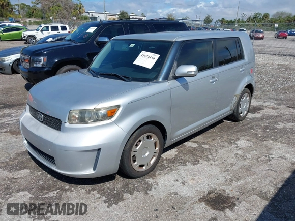 2009 Scion xB with VIN JTLKE50E591067272, listed as a IAAI auction lot 41674440 with 170,116 mi miles. Bid and sale history available at carsss.com. Image 2.