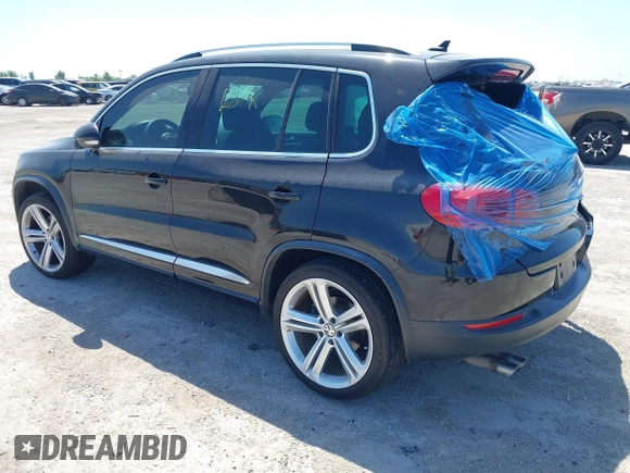 2014 Volkswagen Tiguan SEL with VIN WVGAV3AX4EW025339, listed as a IAAI auction lot 42313665 with 96,756 mi miles and . Bid and sale history available at DreamBid. Image 3.