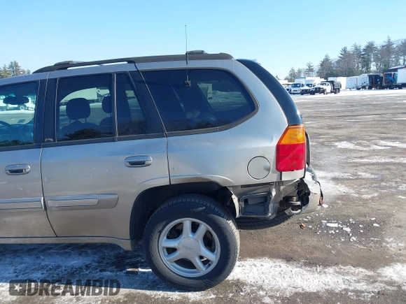 2002 GMC Envoy SLT with VIN 1GKDT13S822154592, listed as a IAAI auction lot 41389285 with 153,897 mi miles. Bid and sale history available at carsss.com. Image 12.
