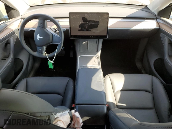 2024 Tesla Model Y with VIN 7SAYGDED7RF163537, listed as a Copart auction lot 48639255 with 7,193 mi miles and Salvage Title. Bid and sale history available at DreamBid. Image 8.