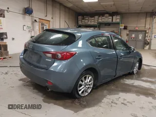 2014 Mazda 3 i Touring z VIN JM1BM1L71E1148770, wystawiony jako IAAI lot #41420978 z przebiegiem 137 385 mil mil oraz . Historia ofert i sprzedaży dostępna na DreamBid. Obrazek 4.