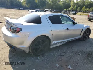 2004 Mazda RX-8 with VIN JM1FE17N040129638, listed as a Copart auction lot 72496364 with 57,966 mi miles and Salvage Title. Bid and sale history available at carsss.com. Image 3.