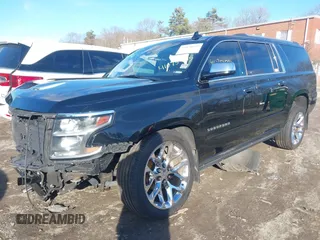 2019 Chevrolet Suburban Premier with VIN 1GNSKJKCXKR111502, listed as a IAAI auction lot 41075435 with 134,555 mi miles and . Bid and sale history available at DreamBid. Image 17.