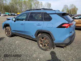 2023 Toyota RAV4 Hybrid XLE with VIN 2T3UWRFV1PW151099, listed as a Copart auction lot 54899775 with 83,437 mi miles and Salvage title. Bid and sale history available at DreamBid. Image 2.