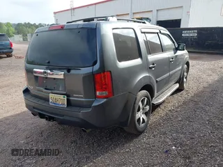 2013 Honda Pilot Touring with VIN 5FNYF3H92DB001308, listed as a IAAI auction lot 42007426 with 225,869 mi miles and . Bid and sale history available at DreamBid. Image 4.
