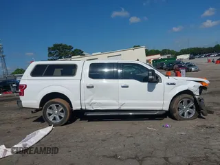 2019 Ford F-150 XL with VIN 1FTEW1C47KKE22590, listed as a IAAI auction lot 42418181 with 123,197 mi miles and . Bid and sale history available at DreamBid. Image 13.