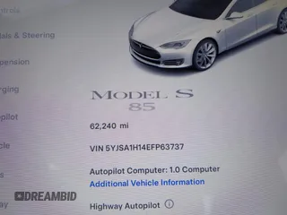 2014 Tesla Model S 60 with VIN 5YJSA1H14EFP63737, listed as a IAAI auction lot 41947610 with 62,240 mi miles and . Bid and sale history available at DreamBid. Image 7.