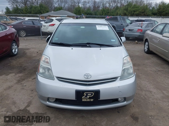 2007 Toyota Prius z VIN JTDKB20U977666406, wystawiony jako IAAI lot #42081233 z przebiegiem Nie podano mil oraz . Historia ofert i sprzedaży dostępna na DreamBid. Obrazek 12.