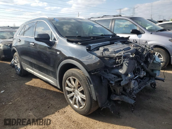 2019 Cadillac XT4 AWD Premium Luxury с VIN 1GYFZDR4XKF170289, выставлен на аукционе Copart как лот 52112025 с пробегом 100 524 миль миль и Списание • Salvage title. История ставок и продаж доступна на DreamBid. Изображение 4.