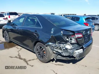 2014 Toyota Camry L with VIN 4T4BF1FK7ER438134, listed as a IAAI auction lot 41881798 with 137,886 mi miles. Bid and sale history available at carsss.com. Image 6.