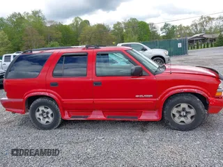 2004 Chevrolet Blazer LS z VIN 1GNDT13X64K127182, wystawiony jako IAAI lot #42188177 z przebiegiem 135 946 mil mil oraz . Historia ofert i sprzedaży dostępna na DreamBid. Obrazek 13.