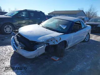 1996 Chrysler Sebring JXi with VIN 3C3EL55H6TT310724, listed as a IAAI auction lot 41424560 with Not Provided miles and . Bid and sale history available at DreamBid. Image 2.