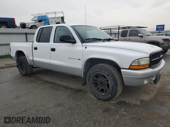 2002 Dodge Dakota SLT z VIN 1B7HL48N22S636413, wystawiony jako Copart lot #47884475 z przebiegiem 226 723 mil mil oraz Czysty tytuł • Clean title. Historia ofert i sprzedaży dostępna na DreamBid. Obrazek 4.