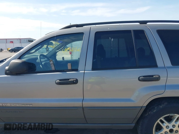 2002 Jeep Grand Cherokee with VIN 1J8GW48N72C207838, listed as a IAAI auction lot 42020294 with 181,283 mi miles and . Bid and sale history available at DreamBid. Image 15.