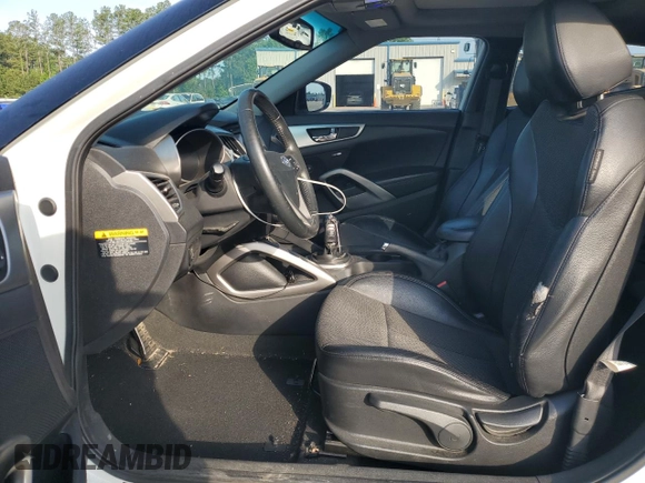 2013 Hyundai Veloster w/Gray Int with VIN KMHTC6ADXDU130886, listed as a Copart auction lot 57478095 with 130,008 mi miles and Salvage title. Bid and sale history available at DreamBid. Image 7.