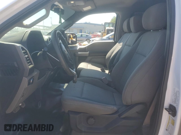 2018 Ford F-150 XL с VIN 1FTEW1EG6JKF05708, выставлен на аукционе Copart как лот 62359605 с пробегом 106 128 миль миль и Списание • Salvage title. История ставок и продаж доступна на DreamBid. Изображение 7.
