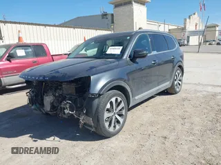 2020 Kia Telluride S with VIN 5XYP64HCXLG008043, listed as a IAAI auction lot 41808448 with 89,658 mi miles and . Bid and sale history available at carsss.com. Image 2.