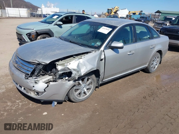 2008 Ford Taurus SEL with VIN 1FAHP27W48G103208, listed as a IAAI auction lot 41675026 with 154,608 mi miles. Bid and sale history available at carsss.com. Image 2.