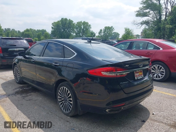 2017 Ford Fusion Titanium with VIN 3FA6P0D92HR252476, listed as a IAAI auction lot 40176942 with 88,818 mi miles and . Bid and sale history available at DreamBid. Image 3.