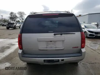 2007 GMC Yukon SLT with VIN 1GKFK130X7R106388, listed as a Copart auction lot 86125434 with 144,528 mi miles and Salvage Title. Bid and sale history available at carsss.com. Image 6.