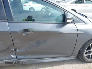 2015 Ford Focus SE with VIN 1FADP3F20FL269846, listed as a IAAI auction lot 42507197 with 143,496 mi miles and . Bid and sale history available at DreamBid. Image 13.