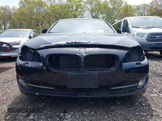 2013 BMW 5 Series 528i xDrive with VIN WBAXH5C55DDW15974, listed as a IAAI auction lot 42185094 with Not provided miles and . Bid and sale history available at DreamBid. Image 6.