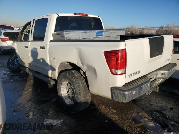 2012 Nissan Titan SV with VIN 1N6AA0EC1CN326088, listed as a Copart auction lot 42799335 with 163,218 mi miles and Salvage Title. Bid and sale history available at carsss.com. Image 2.