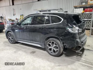 2018 BMW X1 xDrive28i with VIN WBXHT3C37J5L30341, listed as a Copart auction lot 42691505 with 84,523 mi miles and Salvage Title. Bid and sale history available at carsss.com. Image 2.