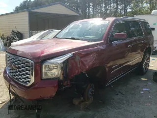 2018 GMC Yukon Denali with VIN 1GKS2CKJ1JR201871, listed as a Copart auction lot 52449594 with 82,761 mi miles and Salvage Title. Bid and sale history available at carsss.com. Image 1.