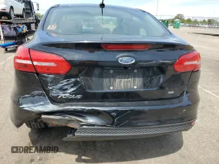 2018 Ford Focus SE z VIN 1FADP3F2XJL276652, wystawiony jako Copart lot #57499965 z przebiegiem 112 388 mil mil oraz Szkoda całkowita • Salvage title. Historia ofert i sprzedaży dostępna na DreamBid. Obrazek 6.