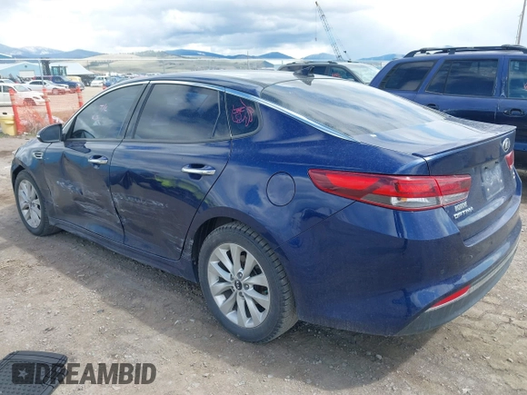 2018 Kia Optima LX z VIN 5XXGT4L32JG205418, wystawiony jako IAAI lot #42062997 z przebiegiem 103 126 mil mil oraz . Historia ofert i sprzedaży dostępna na DreamBid. Obrazek 3.