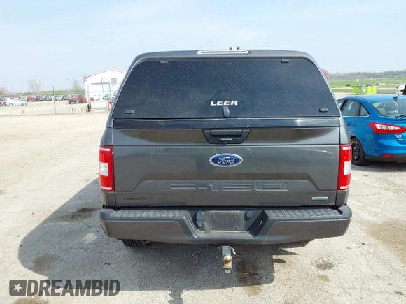 2018 Ford F-150 XL with VIN 1FTEW1EP9JKF56149, listed as a IAAI auction lot 42066727 with 73,689 mi miles and . Bid and sale history available at DreamBid. Image 16.