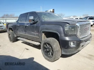 2015 GMC Sierra 2500HD available WiFi Denali with VIN 1GT120E8XFF624844, listed as a Copart auction lot 42063375 with 214,766 mi miles and Salvage Title. Bid and sale history available at carsss.com. Image 4.