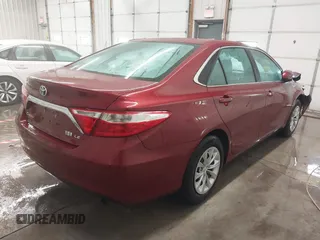 2017 Toyota Camry Hybrid LE with VIN 4T1BD1FKXHU215672, listed as a IAAI auction lot 41382365 with 165,863 mi miles. Bid and sale history available at carsss.com. Image 4.
