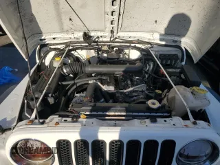 2006 Jeep Wrangler Sport Right Hand Drive with VIN 1J4F449SX6P733578, listed as a Copart auction lot 75113494 with 0 mi miles and Salvage Title. Bid and sale history available at carsss.com. Image 11.
