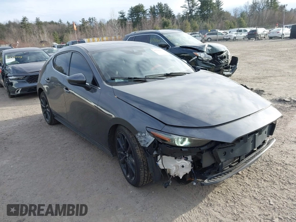 2021 Mazda 3 Premium with VIN JM1BPAML2M1310374, listed as a IAAI auction lot 41190608 with 97,648 mi miles and . Bid and sale history available at DreamBid. Image 13.