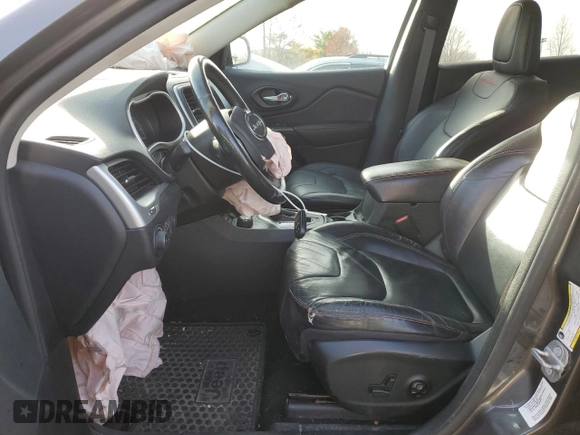 2014 Jeep Cherokee Trailhawk with VIN 1C4PJMBS5EW160669, listed as a Copart auction lot 82000703 with Not provided miles and Salvage title. Bid and sale history available at DreamBid. Image 7.