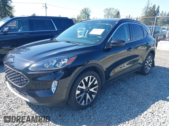 2020 Ford Escape Titanium Hybrid z VIN 1FMCU9DZ9LUC35844, wystawiony jako IAAI lot #42058275 z przebiegiem 74 205 mil mil oraz . Historia ofert i sprzedaży dostępna na DreamBid. Obrazek 17.